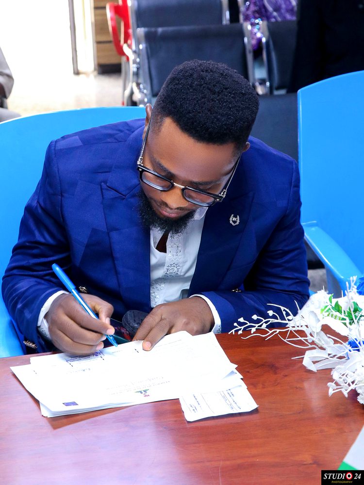 At work, signing documents